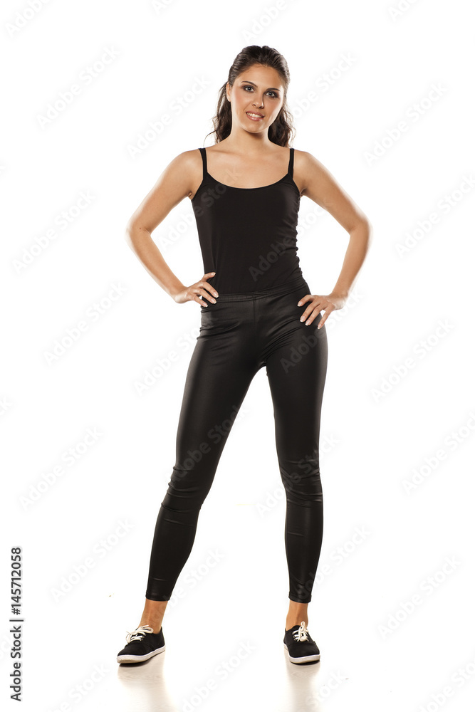Whole figure of a young woman in tights and blouse Whole figure of a young woman in tights and blouse