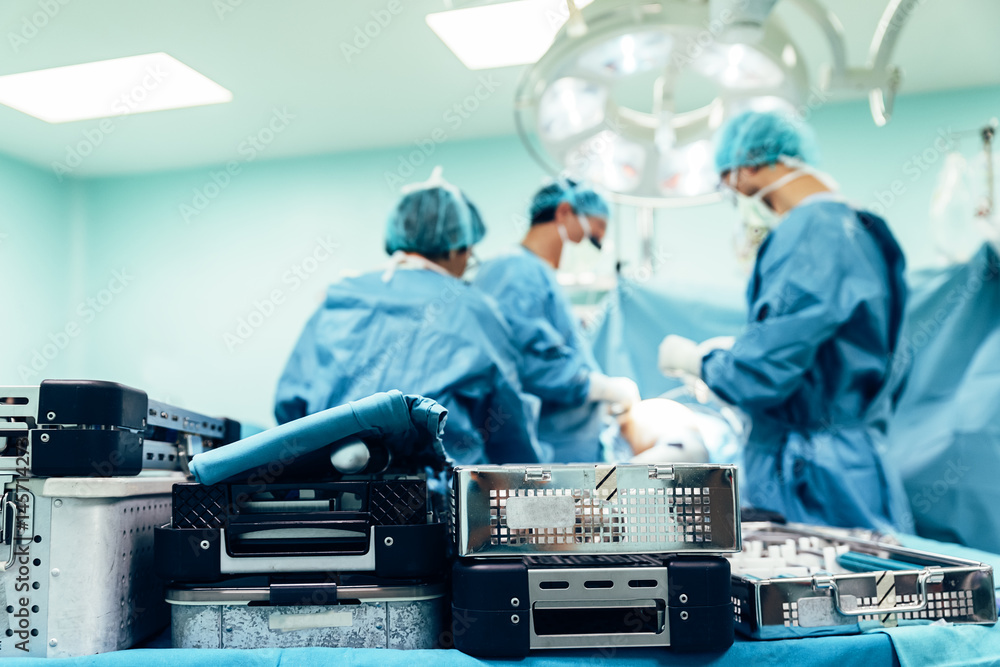 Team of Surgeons Operating. Team of Surgeons Operating.