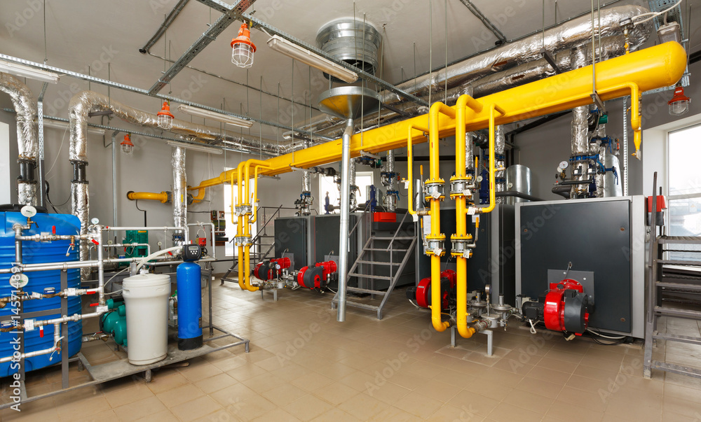 © Aleksey Sergeychik - Interior gas boiler with a water treatment system, a lot of boilers, pipes and sensors © Aleksey Sergeychik - Interior gas boiler with a water treatment system, a lot of boilers, pipes and sensors