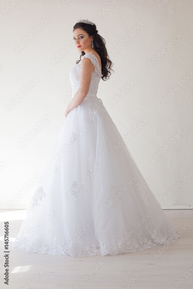 Princess with a Crown in white dress the bride Princess with a Crown in white dress the bride