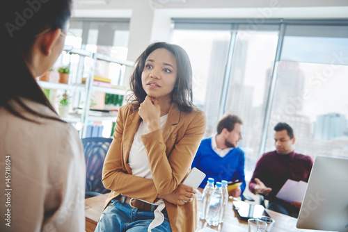 Shocked business woman listening to news . Free Download Shocked business woman listening to news . - GFXLoad