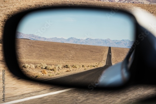 Car mirror, Followed by a car in the desert, paranoia