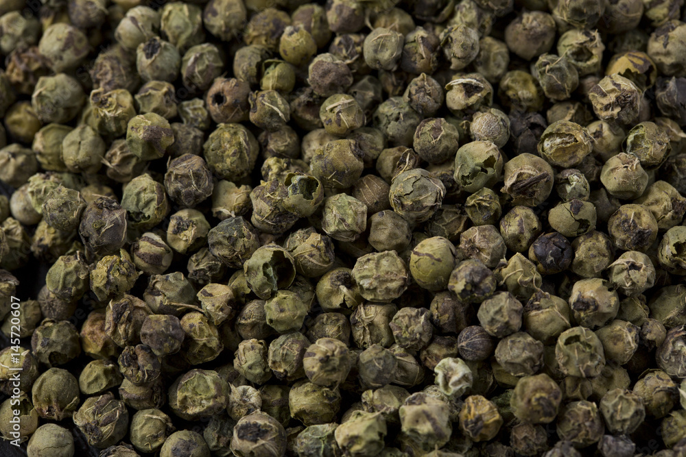 Green peppercorns background. Green peppercorns background.