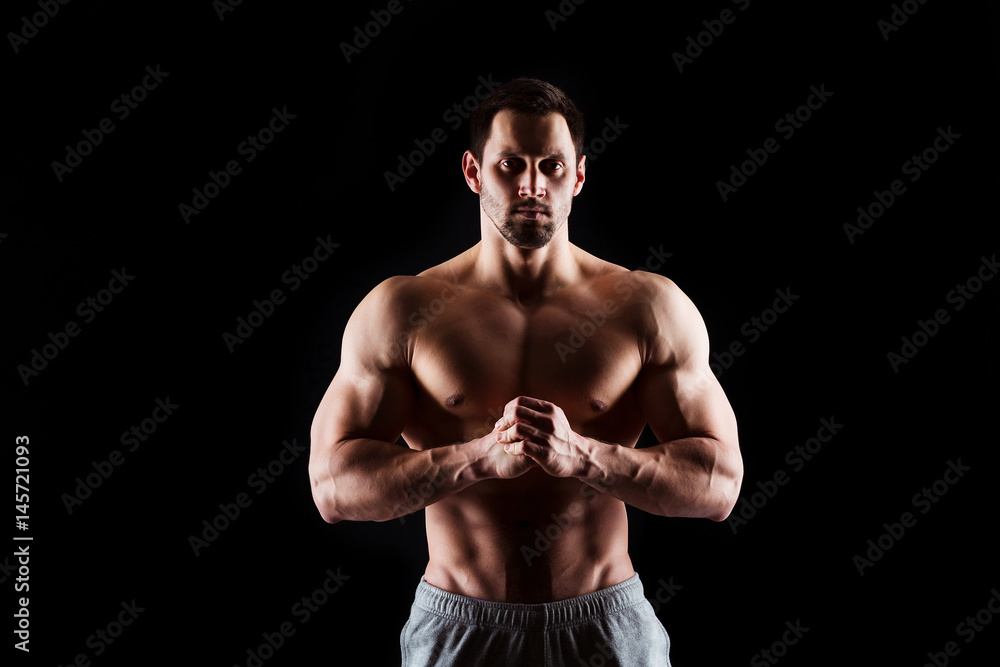 Muscular and sexy torso of young man having perfect abs, bicep and chest. Male hunk with athletic body. Fitness concept Muscular and sexy torso of young man having perfect abs, bicep and chest. Male hunk with athletic body. Fitness concept