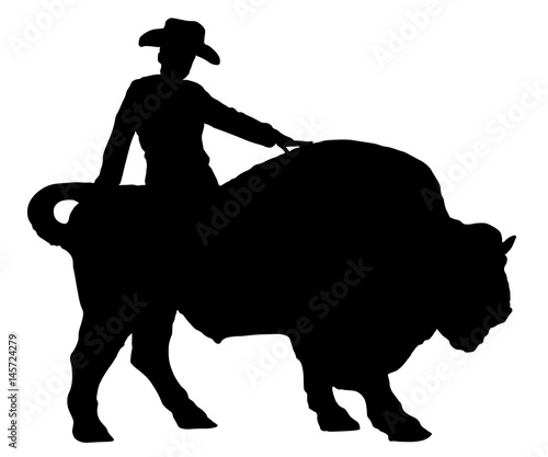 Rodeo man on a buffalo, bison, bull, silhouette