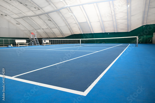 Fotografie The abstract indoor tennis court