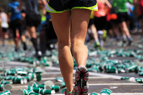 Marathon Runner running on the track photo