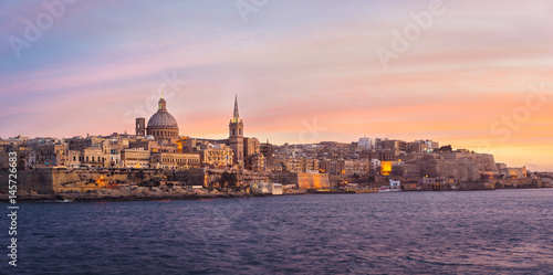 Valletta skyline at sunset viewed from Sliema, Malta