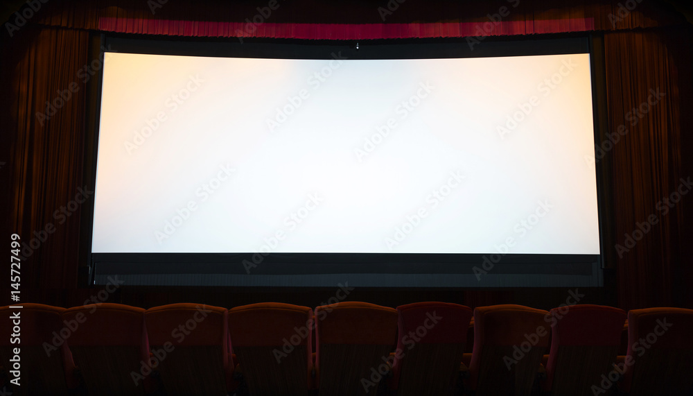 Fototapeta premium cinema screen with open red seats