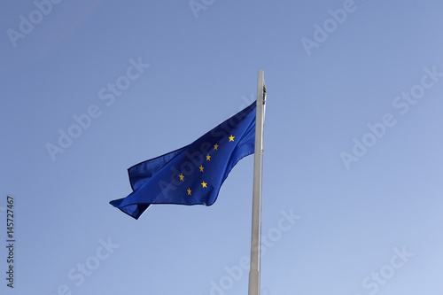 National flag of Alaska on a flagpole