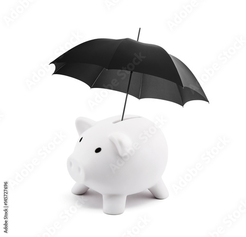 Financial insurance. White piggy bank with umbrella 
