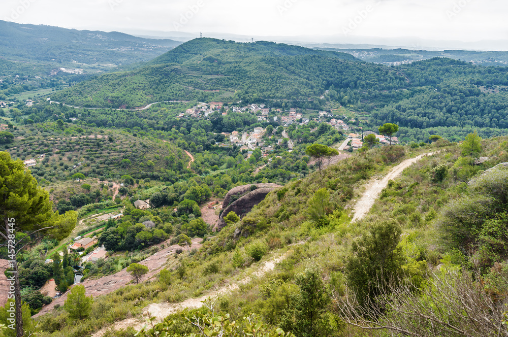 Cloudy view of national park Sant Miquel del Fai not fat from Barcelona, Catalonia, Spain. Cloudy view of national park Sant Miquel del Fai not fat from Barcelona, Catalonia, Spain.