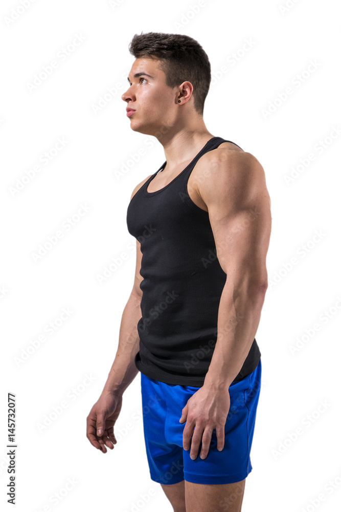 Handsome young muscular man looking up to a side in studio shot, isolated on white background Handsome young muscular man looking up to a side in studio shot, isolated on white background