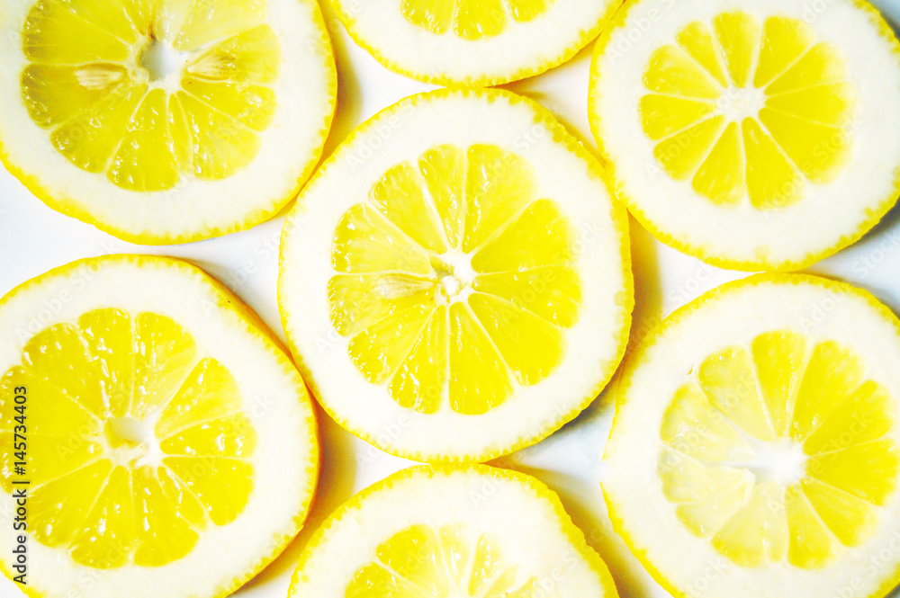 Lemon slices background. Lemon natural texture Lemon slices background. Lemon natural texture