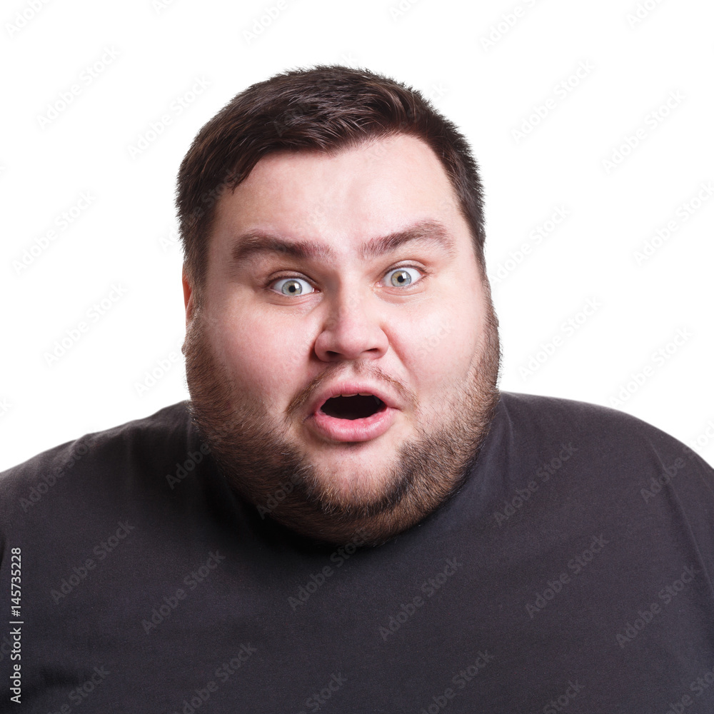 Fototapeta premium Shocking news. Wonder man expressing amaze on face
