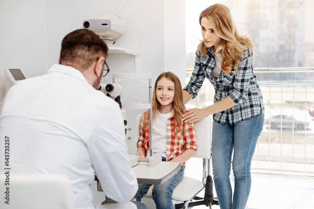 Young admirable teenager receiving doctors advice