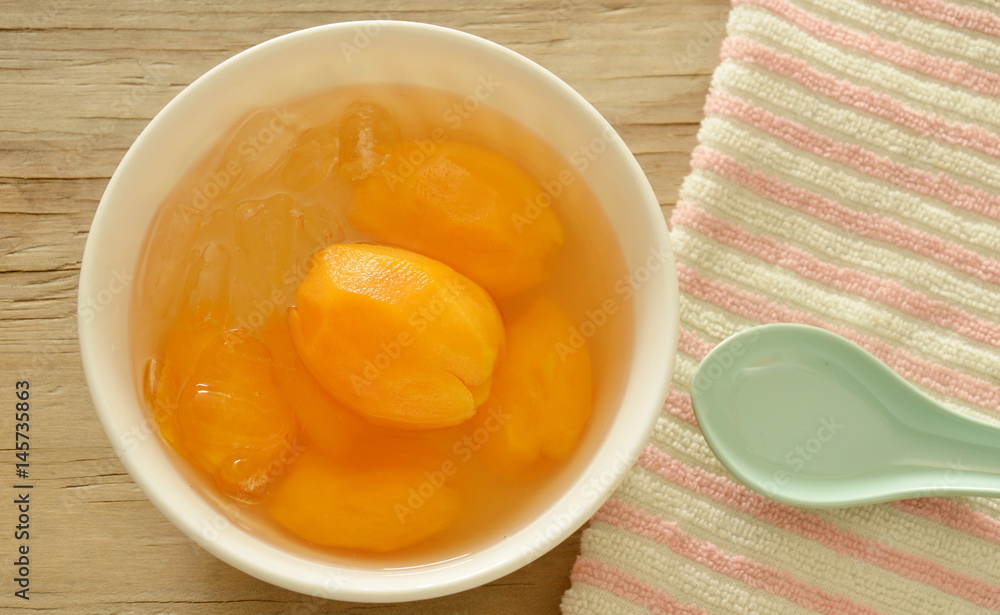 plum mango tropical fruit in syrup with ice cold dessert on cup plum mango tropical fruit in syrup with ice cold dessert on cup