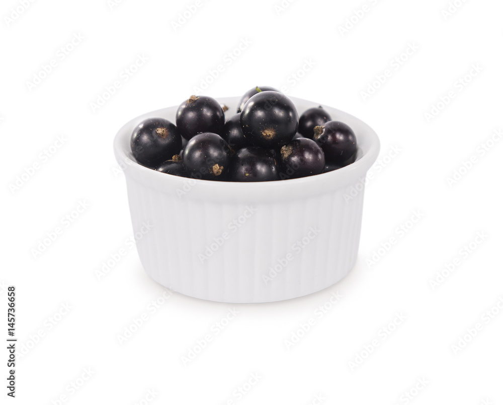 Bowl with blackcurrants isolated on white background. Ripe currants close-up. Background berry. Sweet and juicy berry with copy space for text. Antioxidant and the best berry, a source of vitamin C Bowl with blackcurrants isolated on white background. Ripe currants close-up. Background berry. Sweet and juicy berry with copy space for text. Antioxidant and the best berry, a source of vitamin C
