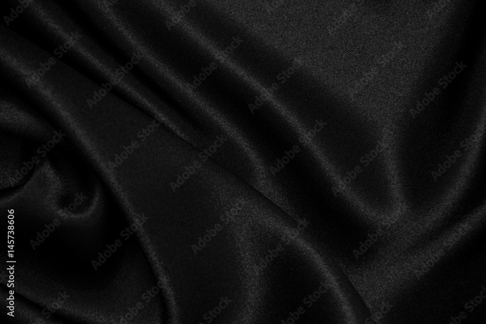 Obraz premium Black silk fabric background