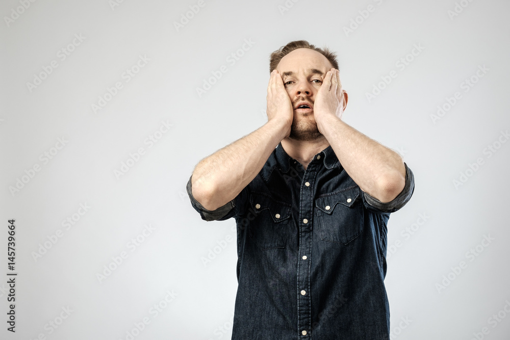 Portrait of upset young man isolated Portrait of upset young man isolated
