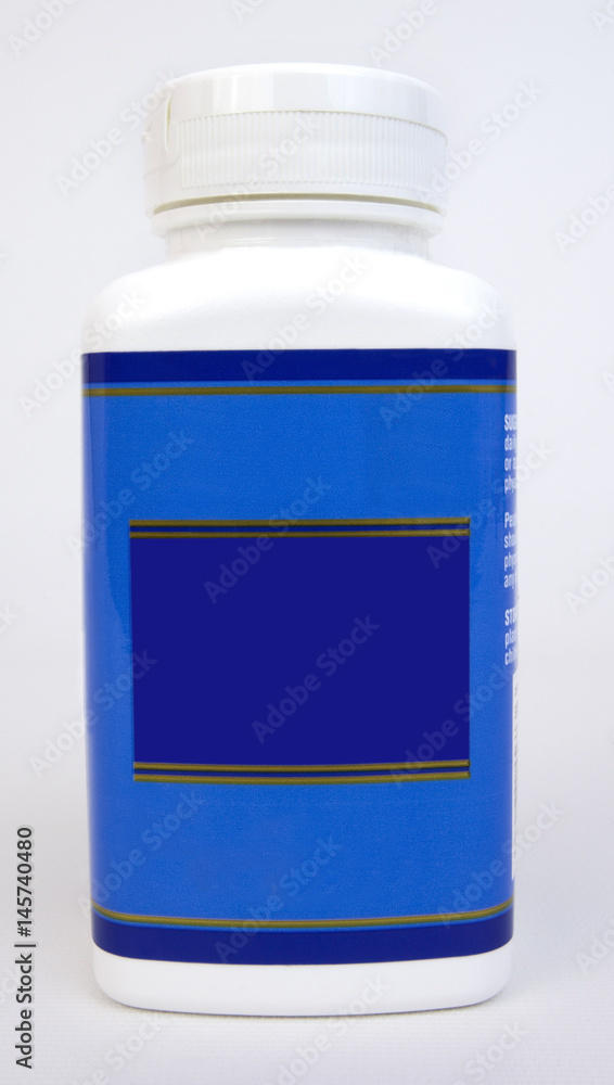 Medication vitamin bottle with blank blue label. Medication vitamin bottle with blank blue label.