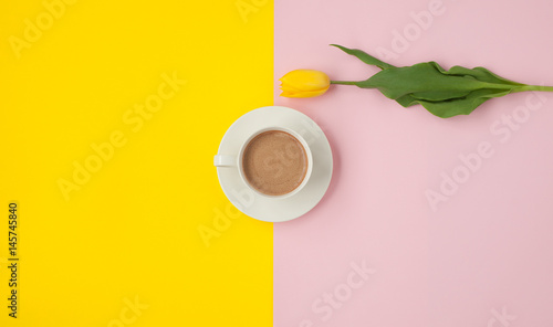 Coffee cup and a tulip