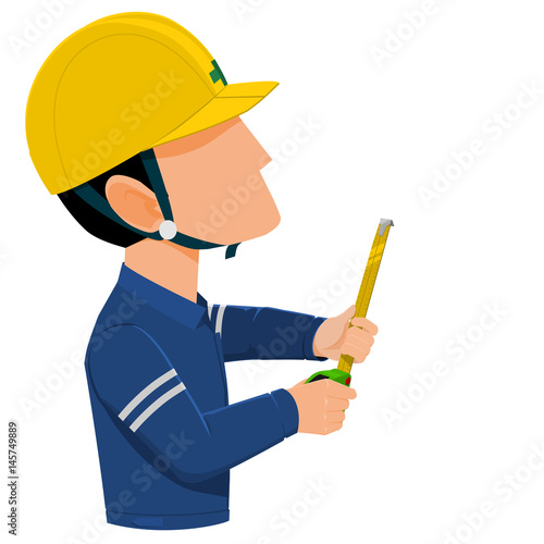worker is measuring with tape measure