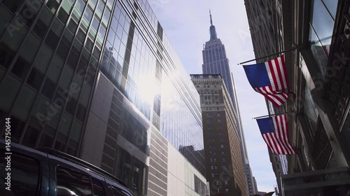 Building in the City with American Flags