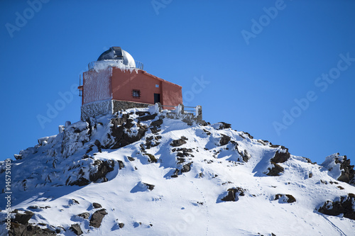 Observatory in a mountain snow. photo