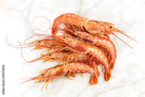 Raw shrimps on plate with copyspace