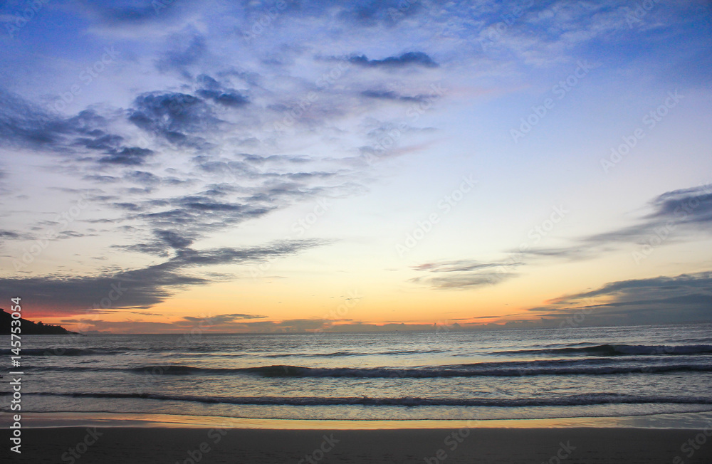 Sunrise on the beach with wave,Thailand Sunrise on the beach with wave,Thailand