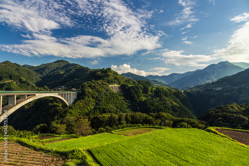 rice field landscape and arch bridge in Takachiho, Miyazaki, Japan.