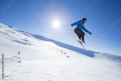 Freeride skier jumping.