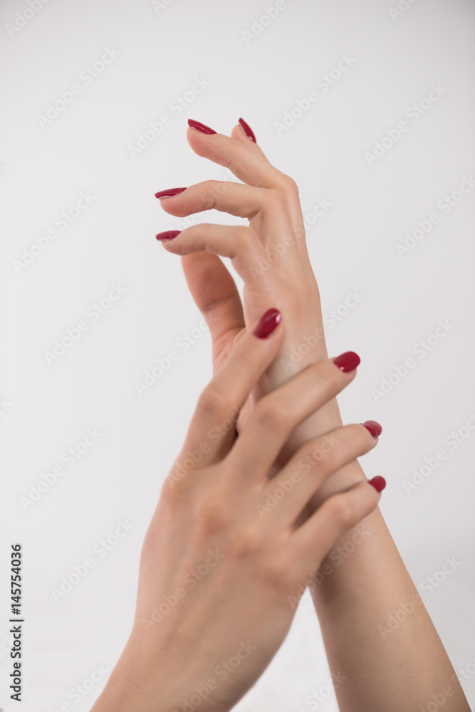 closeup of hands of a young woman closeup of hands of a young woman