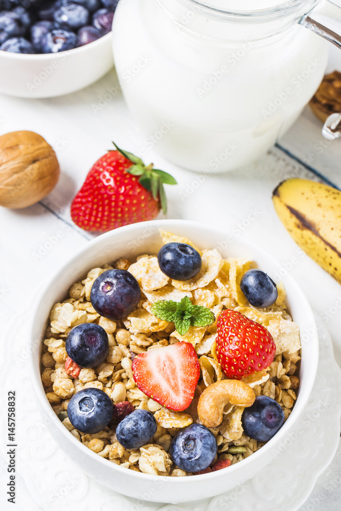 crunchy flakes with blueberries and various yogurts for healthy breakfast, close-up crunchy flakes with blueberries and various yogurts for healthy breakfast, close-up