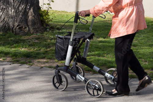 senior lady with rollator photo