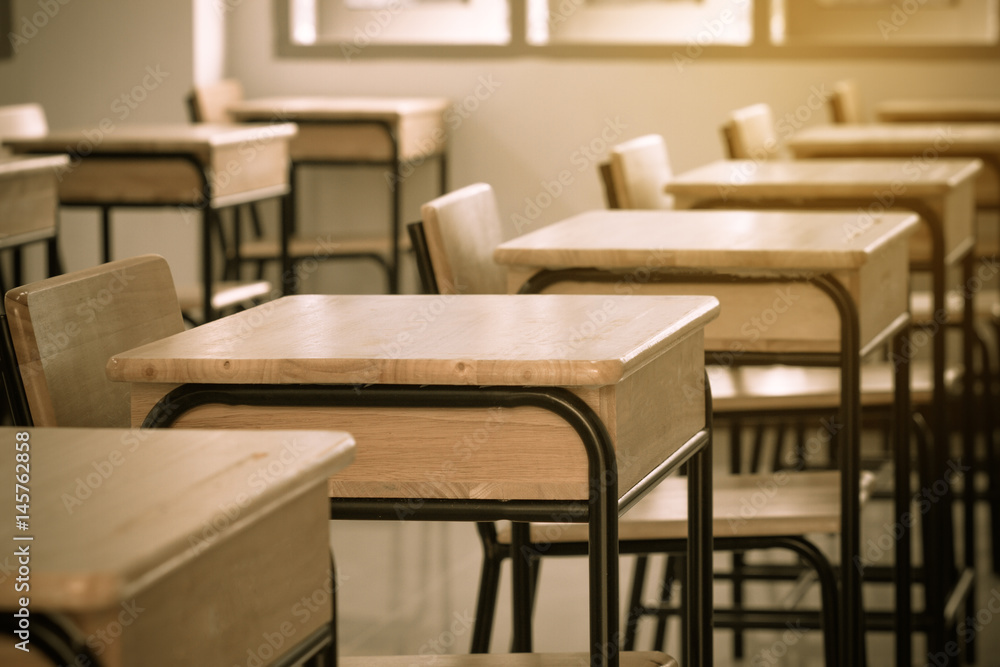 School classroom with desks chair wood, and blackboard in high school thailand, vintage tone education concept School classroom with desks chair wood, and blackboard in high school thailand, vintage tone education concept
