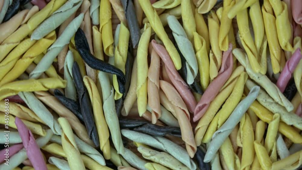 Rotating colorful noodles macaroni food background Rotating colorful noodles macaroni food background