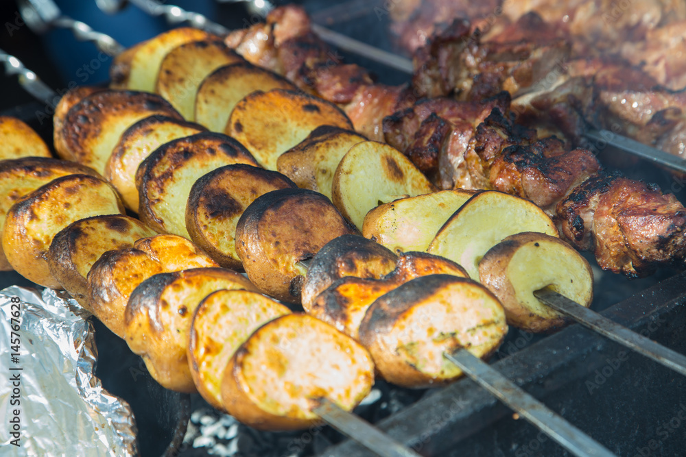 potato . Grilled potatoes in the open air potato . Grilled potatoes in the open air