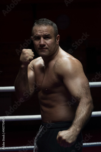 Fototapeta Naklejka Na Ścianę i Meble -  professional kickboxer in the training ring