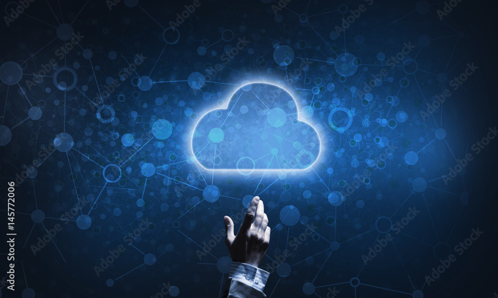 Technology idea concept with glowing cloud icon and touching it finger Technology idea concept with glowing cloud icon and touching it finger