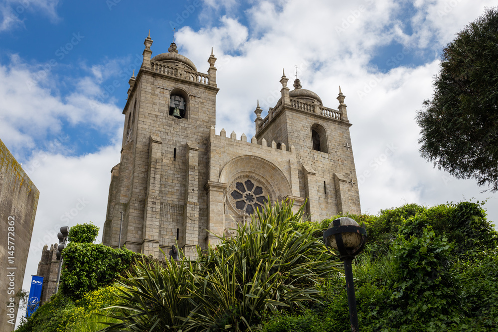 Low Angle View of the Sé do Porto (Porto Cathedral), Portugal, against blue sky