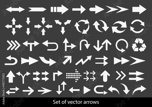 Vector set of white arrows on black background. © Ms VectorPlus