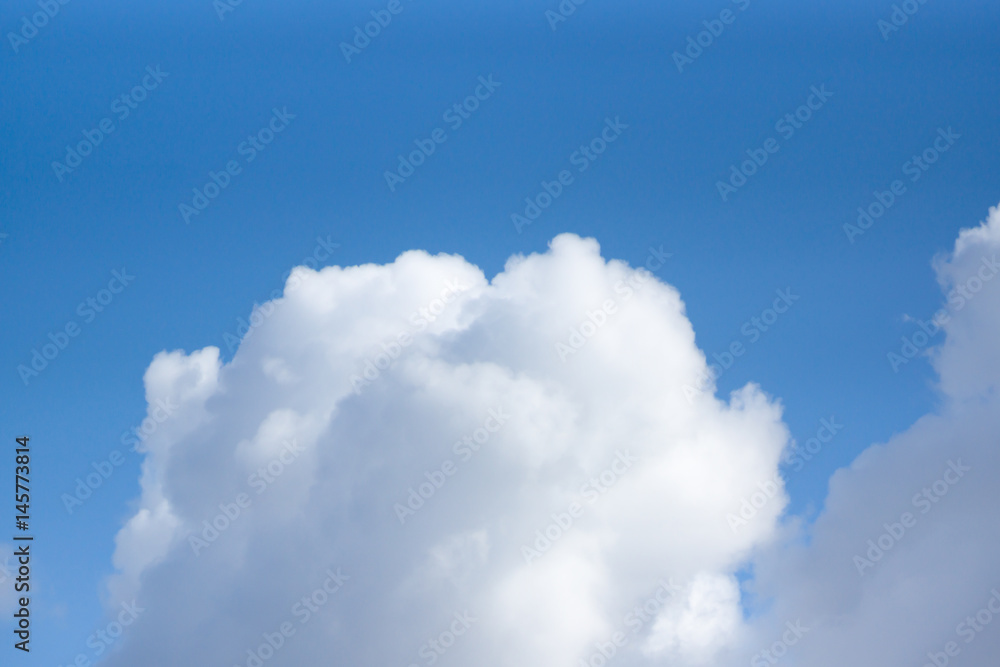 White clouds against a blue sky White clouds against a blue sky