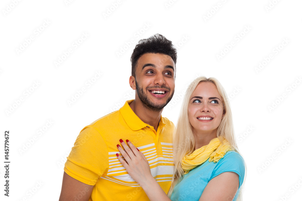 Beautiful Young Happy Couple Love Smiling Embracing Looking Up To Copy Space, Hispanic Man Woman Smile Isolated Over White Background Beautiful Young Happy Couple Love Smiling Embracing Looking Up To Copy Space, Hispanic Man Woman Smile Isolated Over White Background