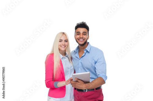Beautiful Young Happy Couple Love Embracing, Hispanic Man Woman Using Tablet Digital Computer Isolated Over White Background