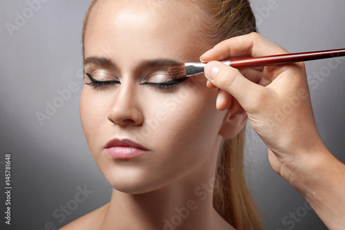 Beautiful young woman in be...