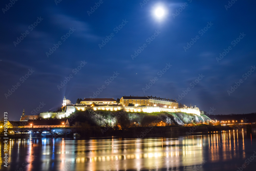 Night view on historical Petrovaradin fortress and Danube river, Novi Sad, Serbia