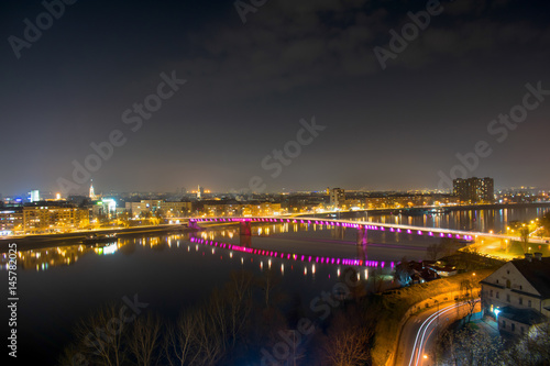 Night view on city on Novi Sad and Danube river from historical Petrovaradin fortress  venue where Exit festival is held each year