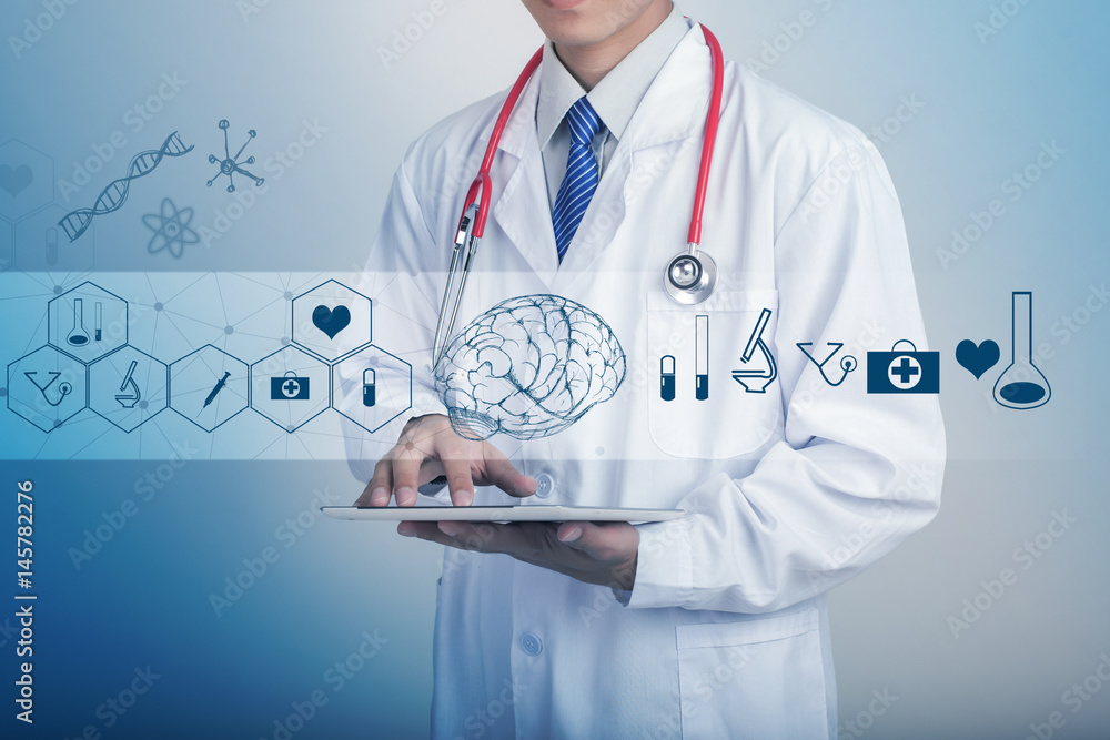 Medicine doctor hand holding stethoscope and working with modern medical icons Medicine doctor hand holding stethoscope and working with modern medical icons